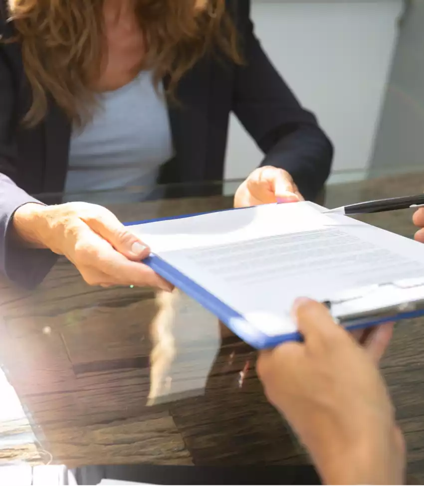 Woman filling out paperwork
