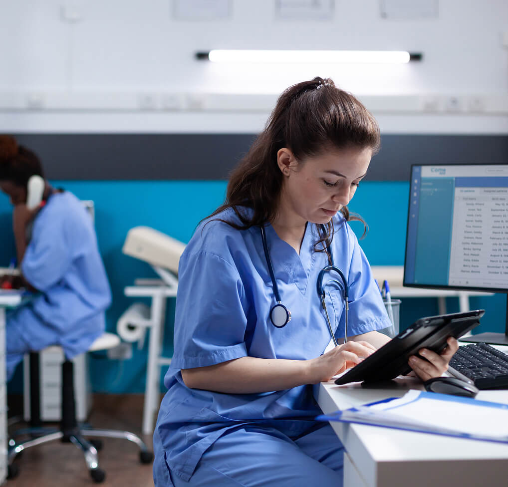 Woman selecting music for hospital waiting rooms